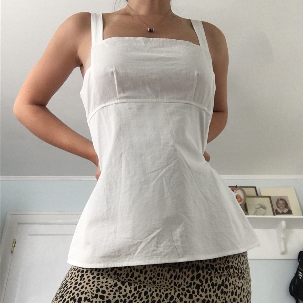 White strait cut blouse.